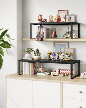 Songmics spice rack on perforated steel shelf adds stylish storage in kitchen.