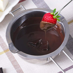 Songziming kitchen scene demonstrates versatile use from chocolate to candles.