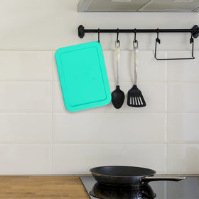 SOPHICO lid shown stacked for space-saving cabinet organization.