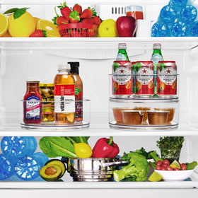 Sorbus 9-inch clear lazy susan in cabinet for can storage.