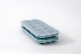 Souper Cubes Kale 2tbsp freezer molds with lids for organized meal prep.