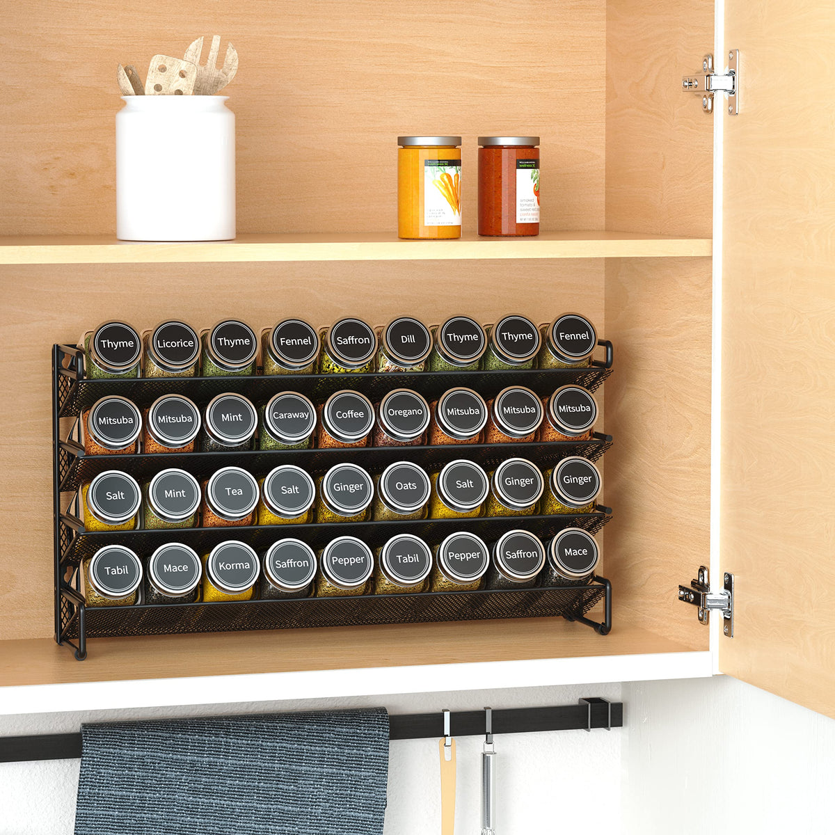 SpaceAid square glass spice jars with visible contents.