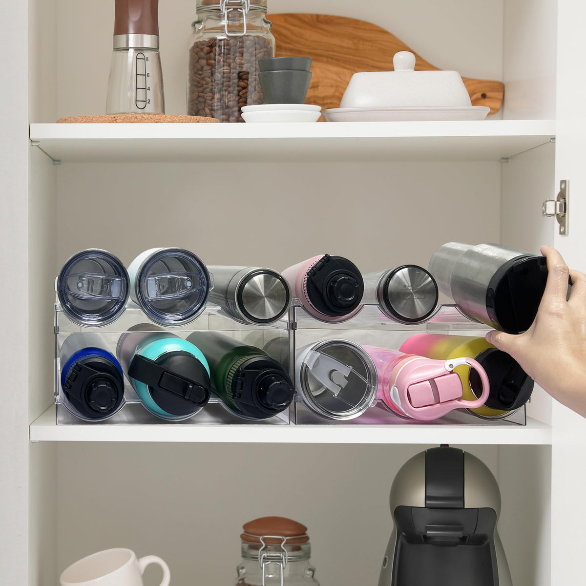 Spaclear 4-tier shelving supports diverse bottle sizes for organized pantry storage.