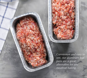 Spare Essentials 2Lb foil loaf pans shown stacked for prep and disposal.