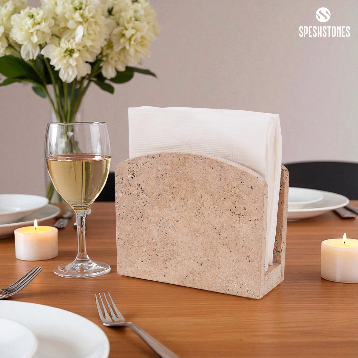SPESHSTONES travertine napkin holder close-up reveals natural texture and artisan detail