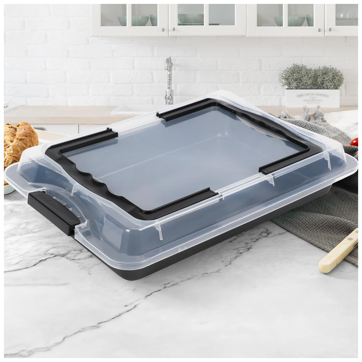 Spmarkt sheet cake pan with lid showing deep capacity for frosted layers.