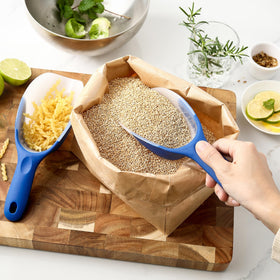 Magnetic hanger keeps the scoop within reach on metal surfaces.