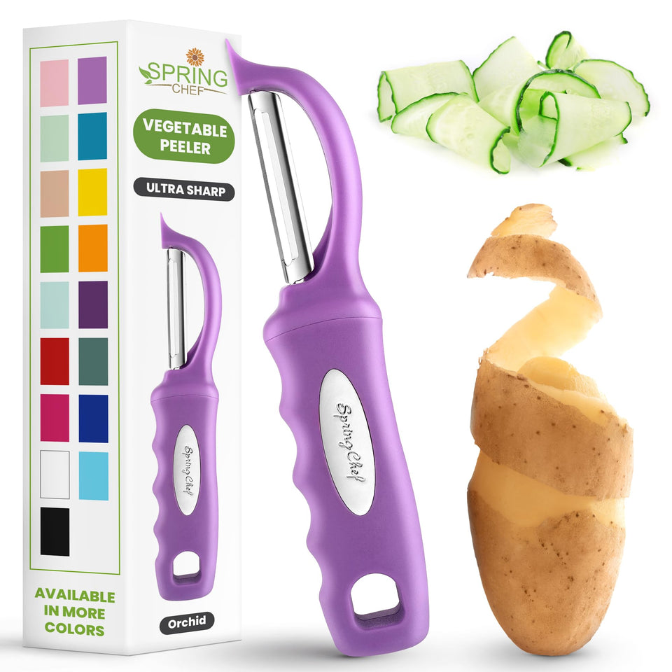 Spring Chef Premium Swivel Peeler held in hand for easy peeling