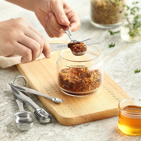 Spring Chef thirteen-piece spoons with Leveler for consistent seasoning.
