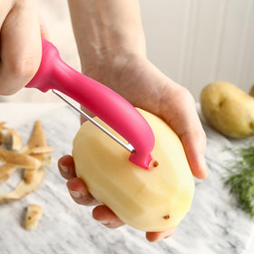 Spring Chef non-slip pink handle ensures comfortable grip while peeling.