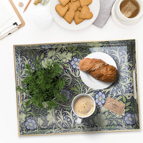 Spsyrine tray on a coffee table adds decorative practicality.