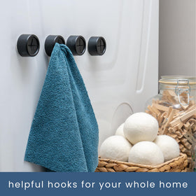 S&T INC towels hanging neatly on matte black hook in kitchen