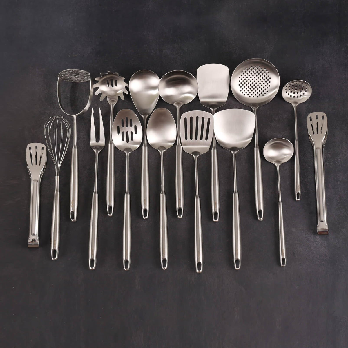 Standcn slotted serving spoon for distributing sauces