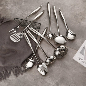 Standcn slotted spatula turner for sturdy turning and draining.