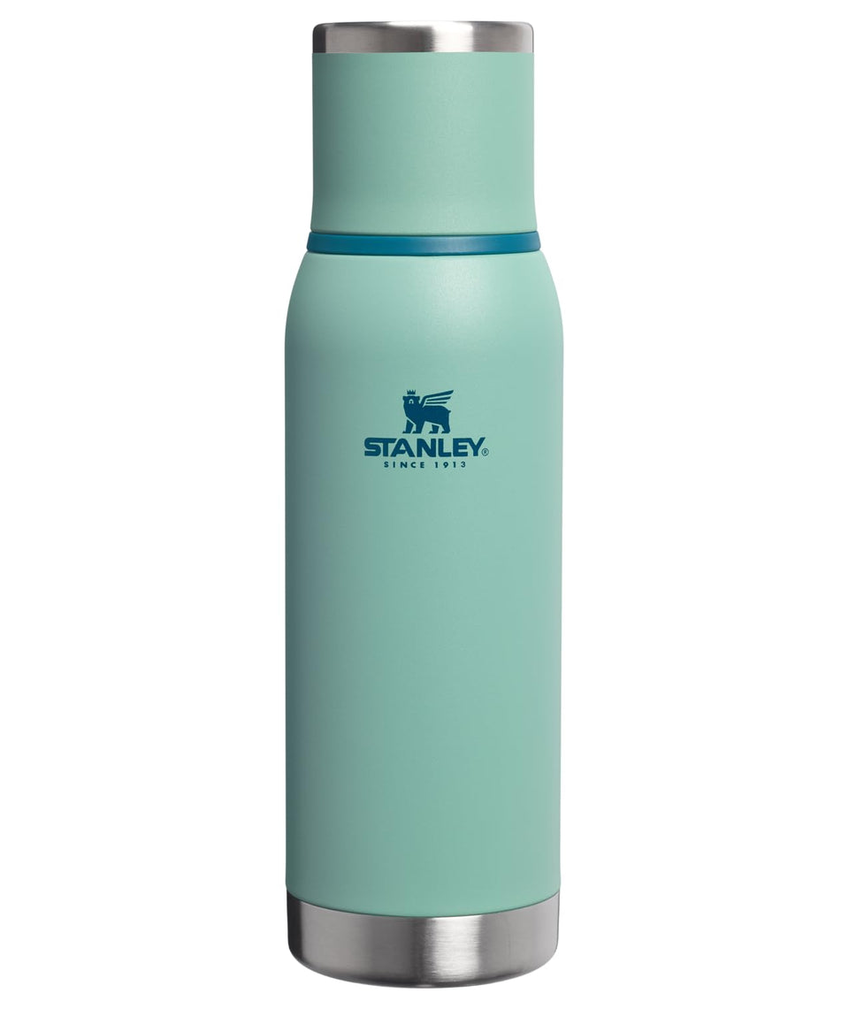 Stanley Adventure-To-Go bottle with leakproof cup lid for easy pouring and travel hydration.