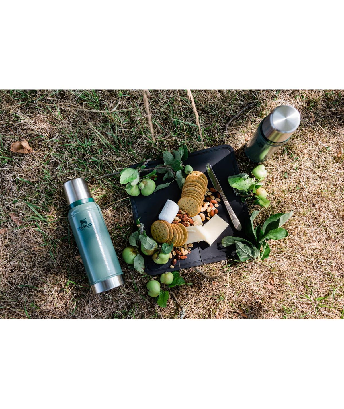 Stanley Classic bottle featuring a collapsible handle for easy transport on trips