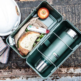 STANLEY Classic Lunch Box on work desk with vintage design for workspace vibes.