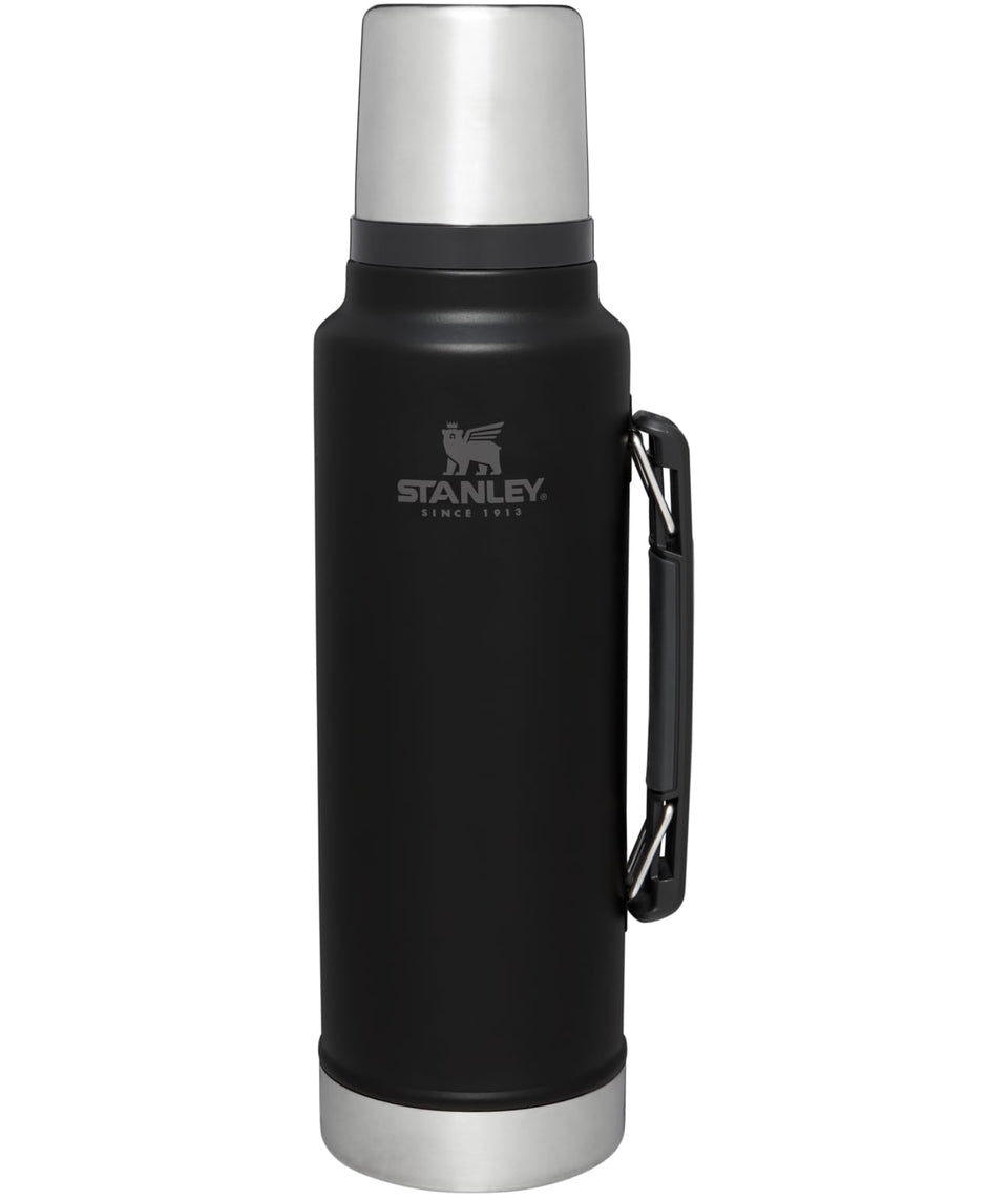 Stanley Classic vacuum bottle with wide mouth keeps coffee hot for hours during camping.