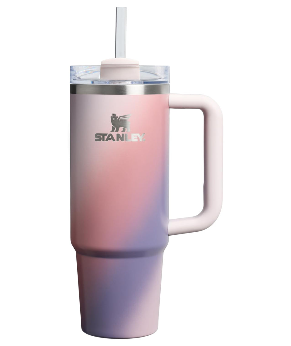 Stanley Quencher H2.0 tumbler with Dawn Spiral finish keeps drinks cold on commutes and workouts.