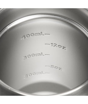 Stanley Suburban Mug with drink-through lid for spill-free sipping.