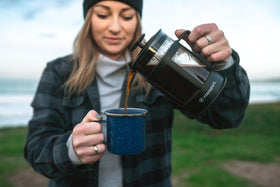 Stansport enamel mug blue rim detail shows durable steel rim.