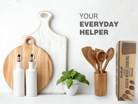 StarBlue acacia wood holder on counter keeps tools accessible and neat.