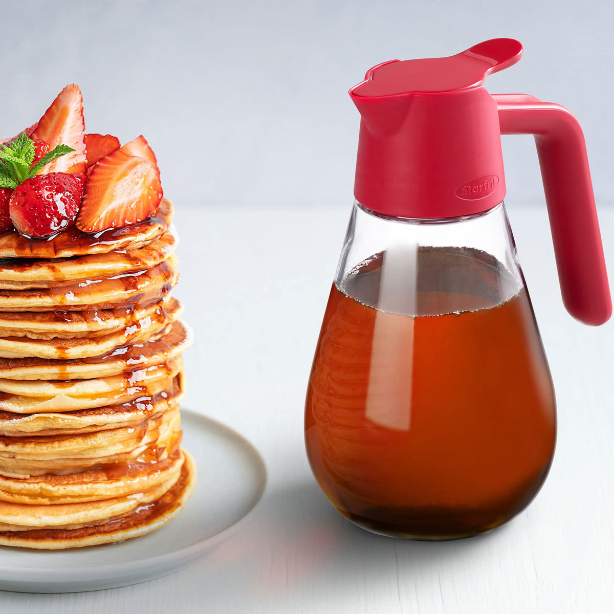 Starfrit Dripless Dispenser has a weighted base for stable handling.