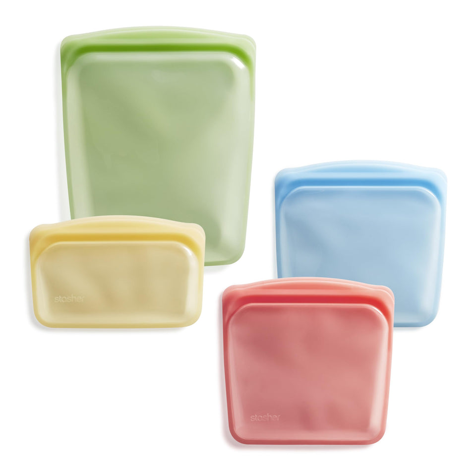 Stasher half gallon green bag showing leak-free Pinch-Loc seal for secure fridge storage