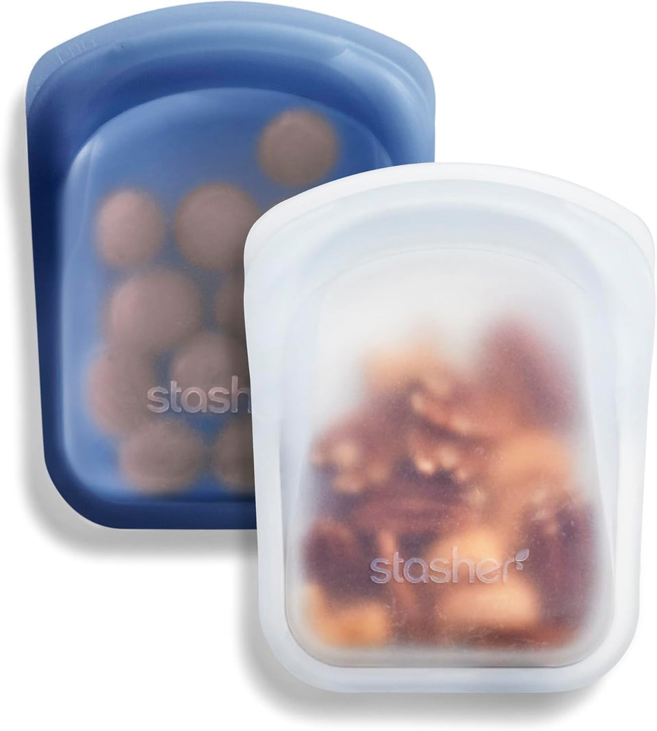Stasher pocket bag in clear showing 4oz capacity for on-the-go snacks