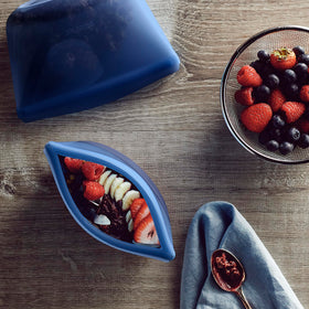 Stasher silicone bowl for 2-cup capacity ideal for meal prep and snacks.