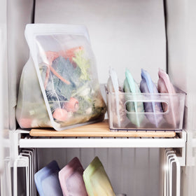 Stasher Stand-Up Mega Bag filled for meal prep and organized storage.