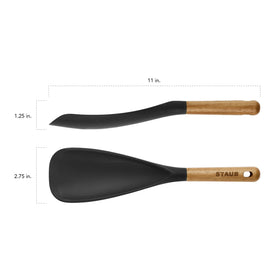 STAUB BPA-free silicone tool stays cool and durable during high-heat sautéing.