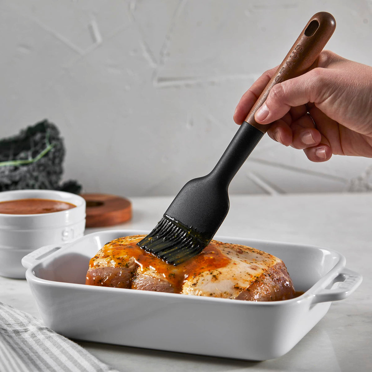 STAUB pastry brush with acacia wood handle delivers ergonomic comfort and eye-catching grain.