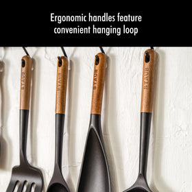 STAUB acacia-handle spatula combines grip and natural wood aesthetic