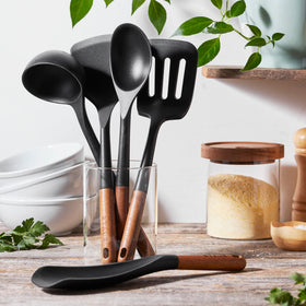 STAUB silicone ladle for precise scooping and smooth stirring.