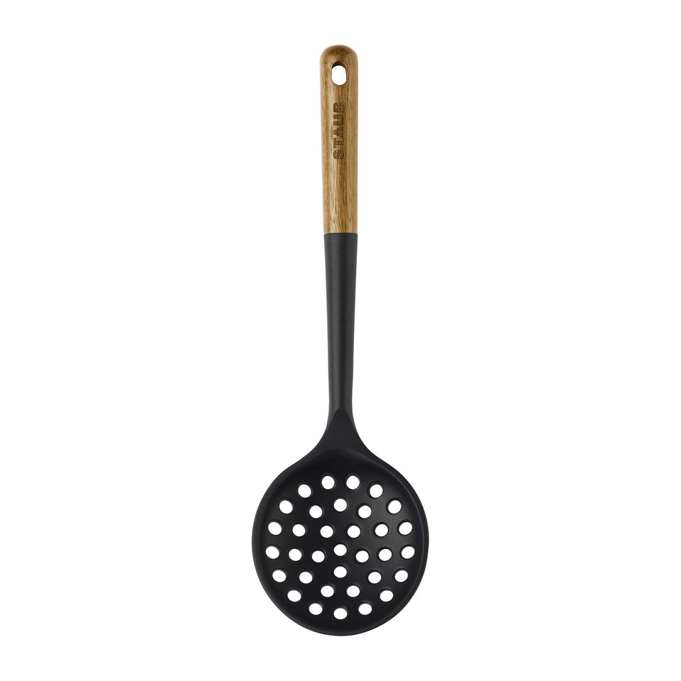 STAUB skimmer spoon in matte black silicone, ideal for nonstick pans