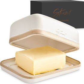 Steinzeit butter dish with lid on countertop keeps butter fresh.