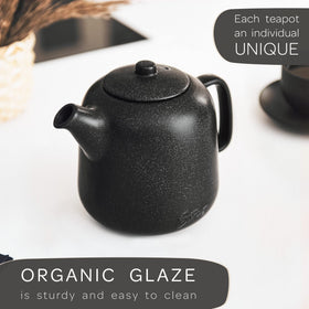 Steinzeit teapot displays matte black reactive glaze design