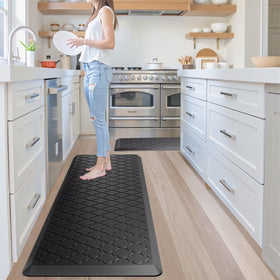 StepAura mat placed near the sink supports standing dishwashing