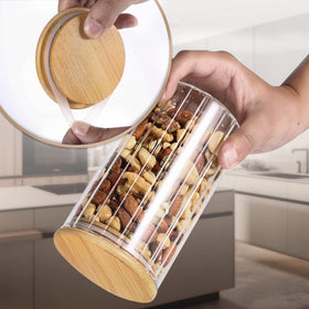 Steviieden jar showing oats and nuts ready for pantry organization.
