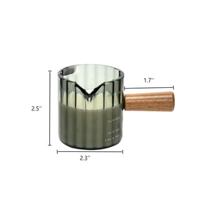 Steviieden measuring cup shows ml markings for accurate pours.