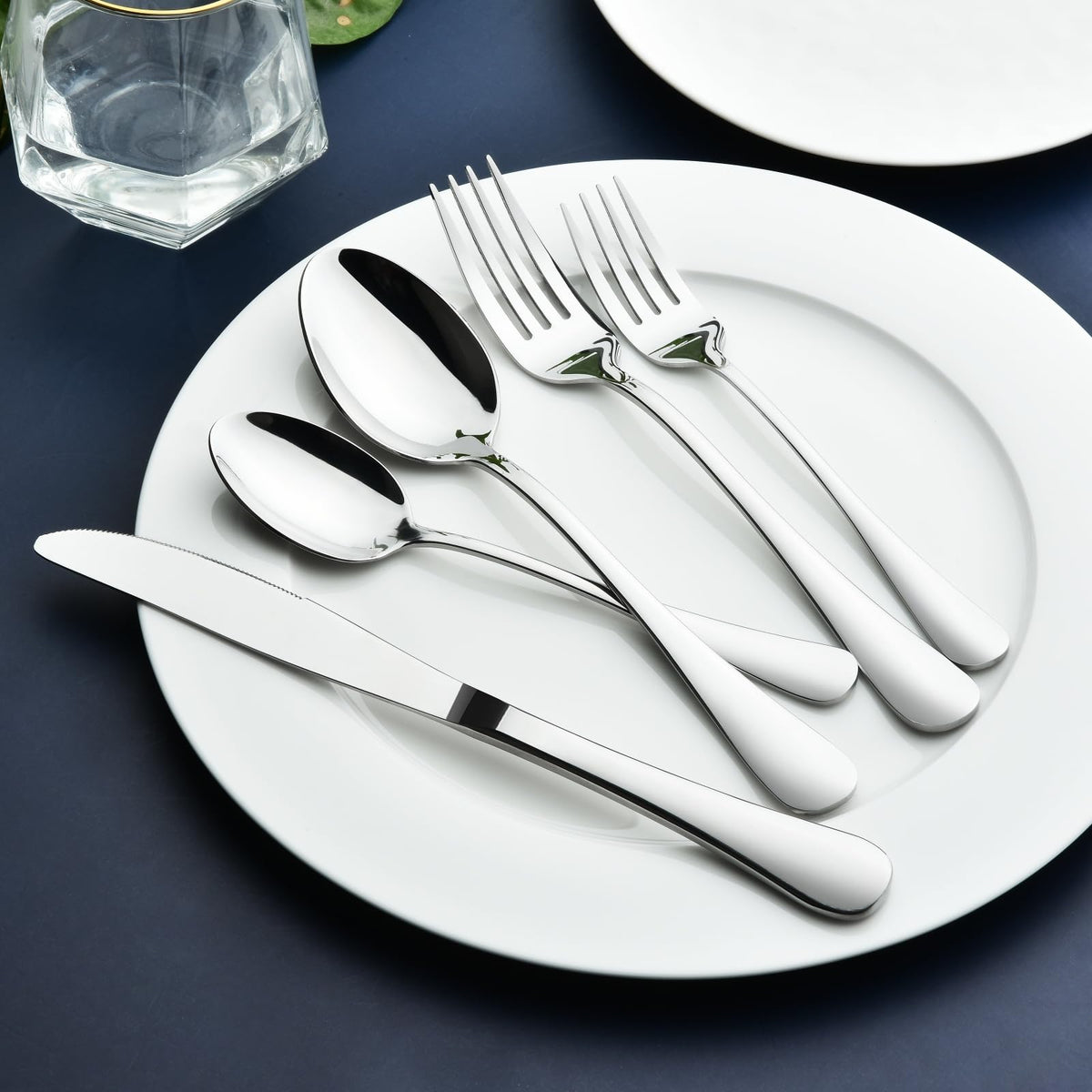 STILLOYE 40-piece silverware set salad forks with comfortable grip for extended meals.