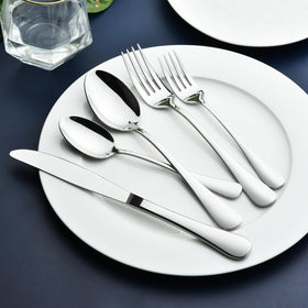 Stilloye dinner forks flatware close-up highlights balanced weight for comfort