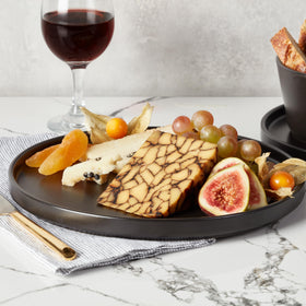 Celina matte black glaze enhances contemporary tabletop appeal.
