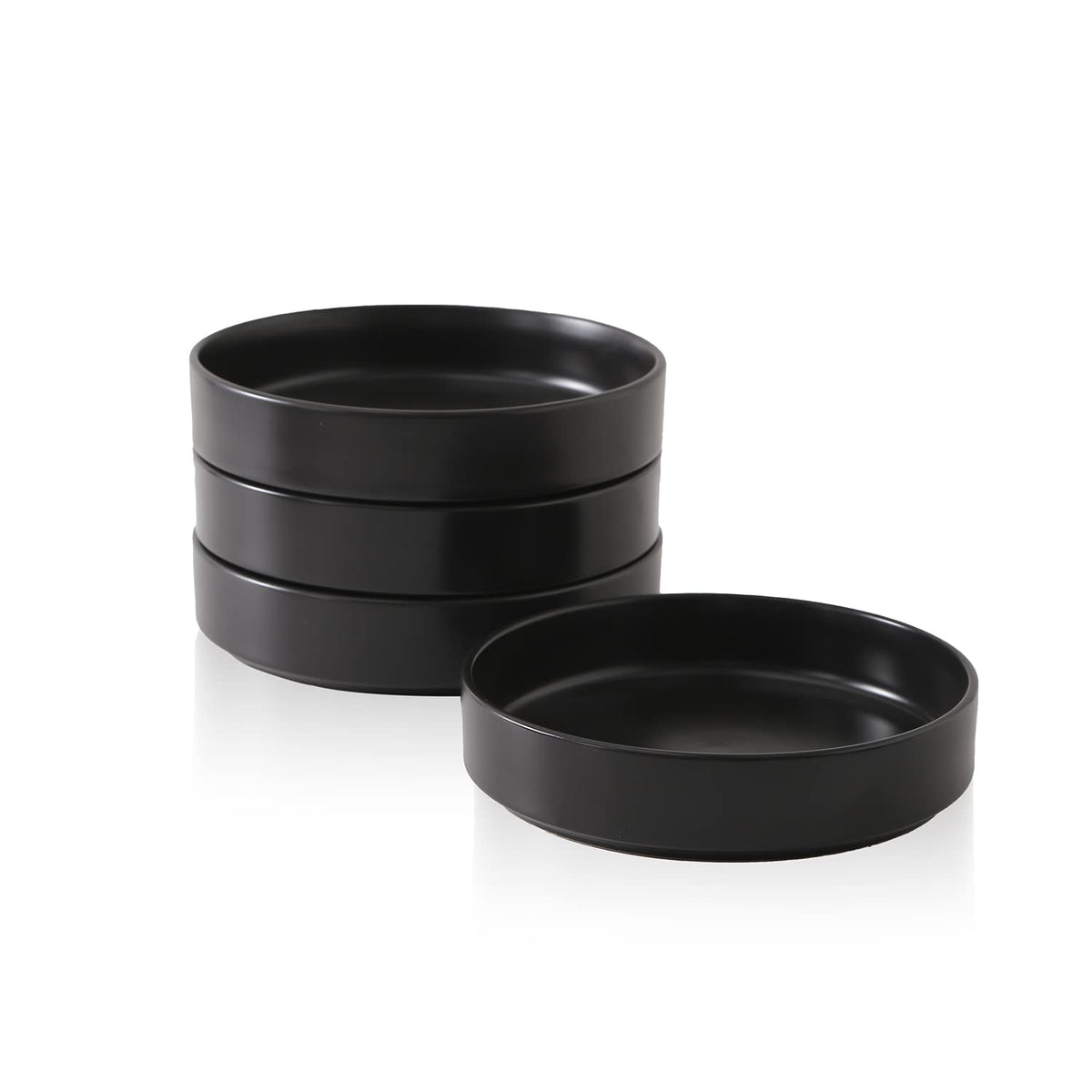 Stone Lain Celina 8-inch stoneware pasta bowls in black, elegant dining presentation.