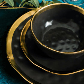 Stone Lain Florian bowl in black with gold rim and textured surface for dramatic presentations