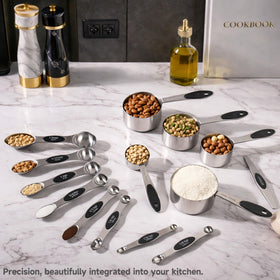 Strelitsia cups with a pour spout reduce spills during pouring.