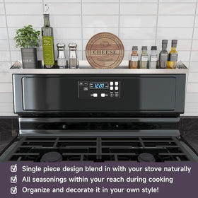 STUTOV spice rack on stove top neatly organizes bottles for quick access.