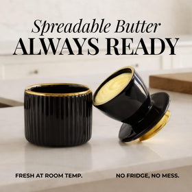 Styled Settings black-gold ceramic butter dish enhances kitchen counters.