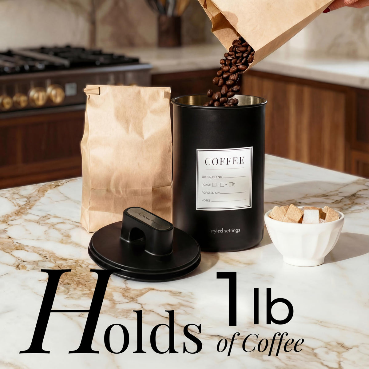 STYLED SETTINGS matte black stainless steel canister on counter